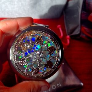 Brand New Avon compact mirror with pouch